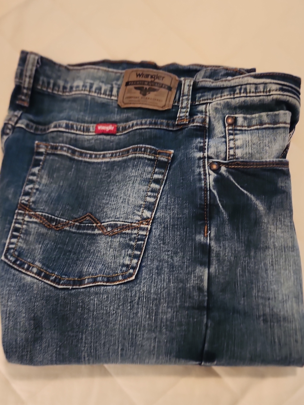 Wrangler Men's Distressed Medium Blue Relaxed Jeans